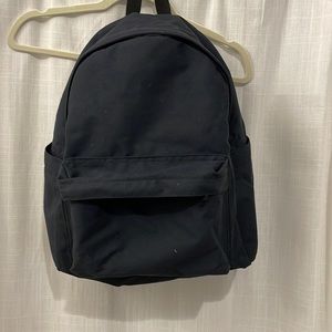 Uniqlo Navy Backpack with laptop slots